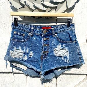 Distressed denim shorts